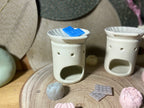 Brûleur en forme de coquillage